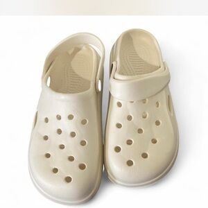 Cream Sandals with Perforated Design and Rotating Heel Strap